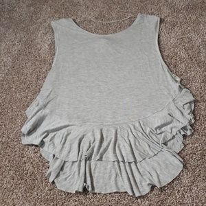 Gray sleeveless shirt. NEVER WORN.